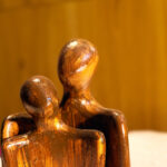 NIH Ceramic Loving Couple Showpiece with a Wooden Design.